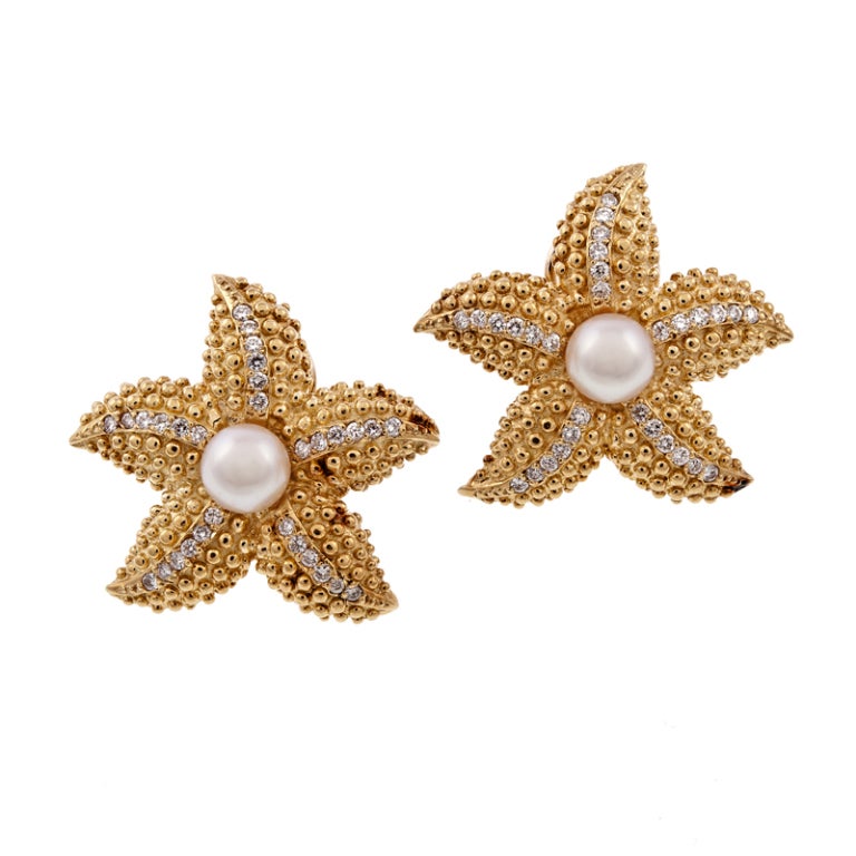 Whimsical collection of earrings and three brooches in a charming starfish design, crafted of 14 karat gold. Beautifully detailed and textured, with 7.5mm pearls and a total of approximately three carats of diamonds to add another layer of interest,