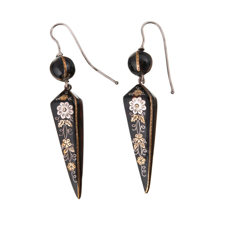Just the right length, measuring 2.25 inches from the top of the wire to the tip of the drop, these earrings are a feminine and whimsical antique treasure. Devotees of antique jewelry adore the 