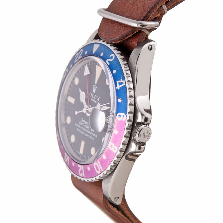 Novel on many levels: This watch has a beautiful matte black dial with creamy markers, faded magenta and blue bezel and the added distinction of Tiffany & Co on the dial. These co-branded Rolex timepieces are always of particular note and have been
