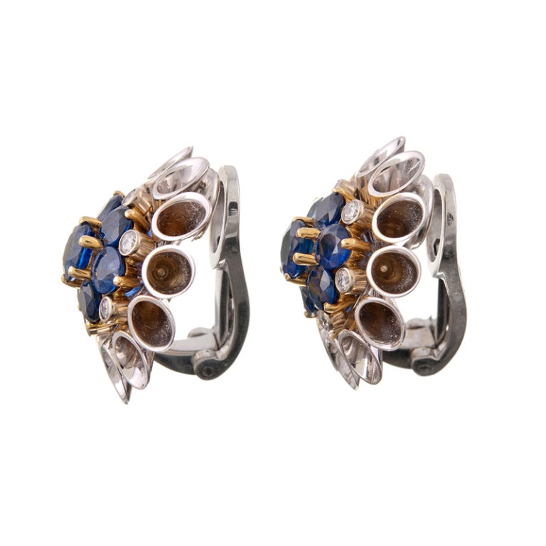 Unique design features with white gold tubes bursting forth from a cluster of extremely fine blue sapphires. Aletto brothers is renowned for their creativity and these earrings are unlike any others.  With approximately 4.50 carats of intense blue