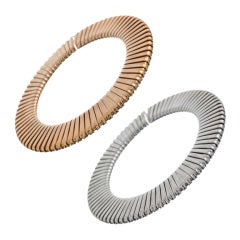 SET of CONTEMPORARY 18K BANGLES by "CARLO WEINGRILL"