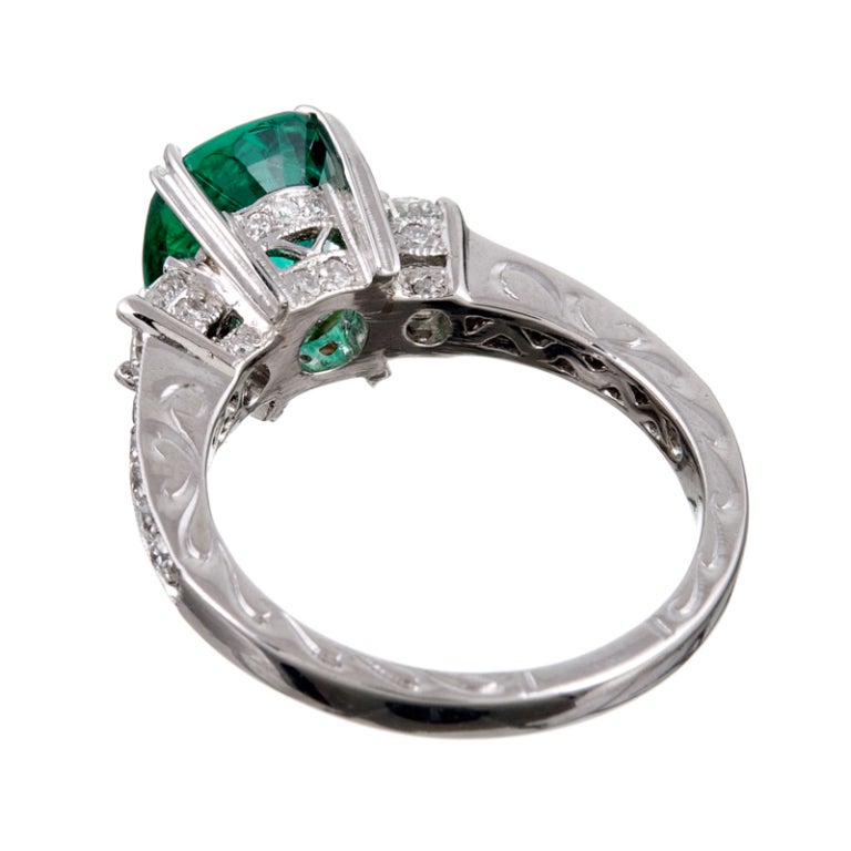 Women's 2.46ct Oval Emerald Diamond Platinum Three-Stone Ring