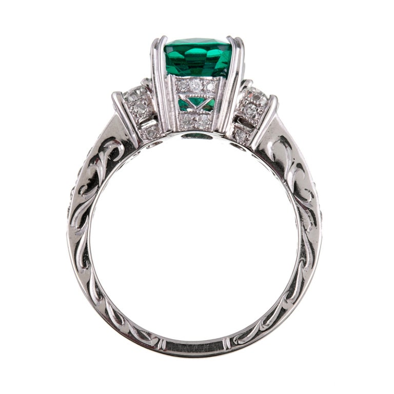 2.46ct Oval Emerald Diamond Platinum Three-Stone Ring 1