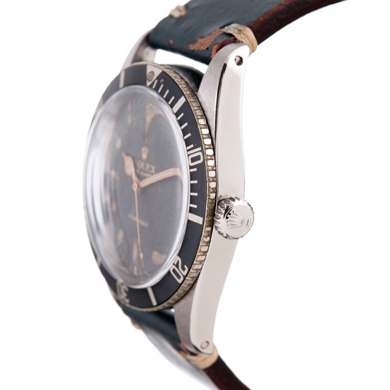 Great vintage look in a no-crown-guard Submariner. No depth rating on the dial. Lovely vintage appeal, the dial is on original condition.

All of our vintage watches have been serviced by our Rolex-certifed master watchmaker and come with a one