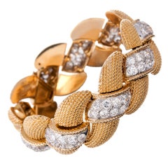 Important and Fine Braided Yellow Gold and Diamond Bracelet 12