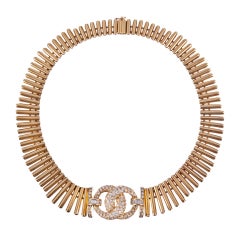 Sophisticated and Substantial Golden Collar with Diamonds