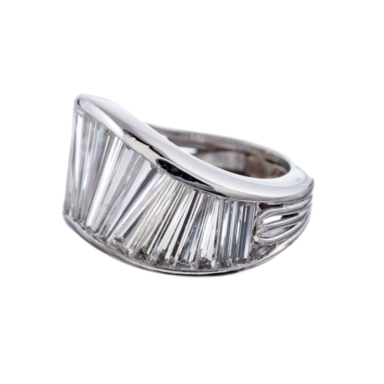 An incredibly unique and stylish diamond and platinum band, incorporating a 