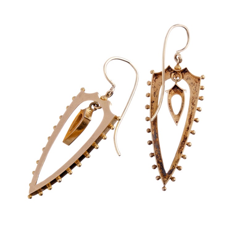 14k yellow gold Victorian earrings, just a hair under 2 inches in overall length and feather-light. Unusual design, shield shaped with 