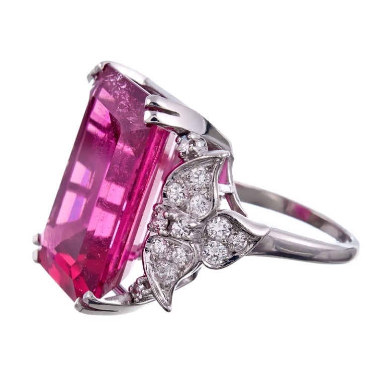 Future heirloom: Classic platinum 1950s design, featuring an enormous pink tourmaline, softened by diamond set leaves, which allow the mounting to gently taper down the sides of the finger. The tourmaline weighs 22 carats, measures 21 x 16