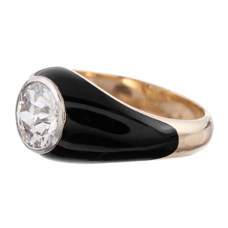 18k yellow gold ring with a 1.87ct old European cut diamond set in a platinum bezel and finished with black enamel. A fine and unusual piece, suitable for a lady or a gentleman. Accompanied by an IGI appraisal report stating K color, Vs2 clarity for