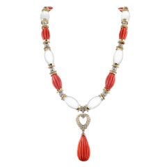 Sophisticated Carved Coral and Crystal Necklace