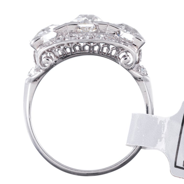 Women's Art Deco Three Stone Diamond and Platinum Ring