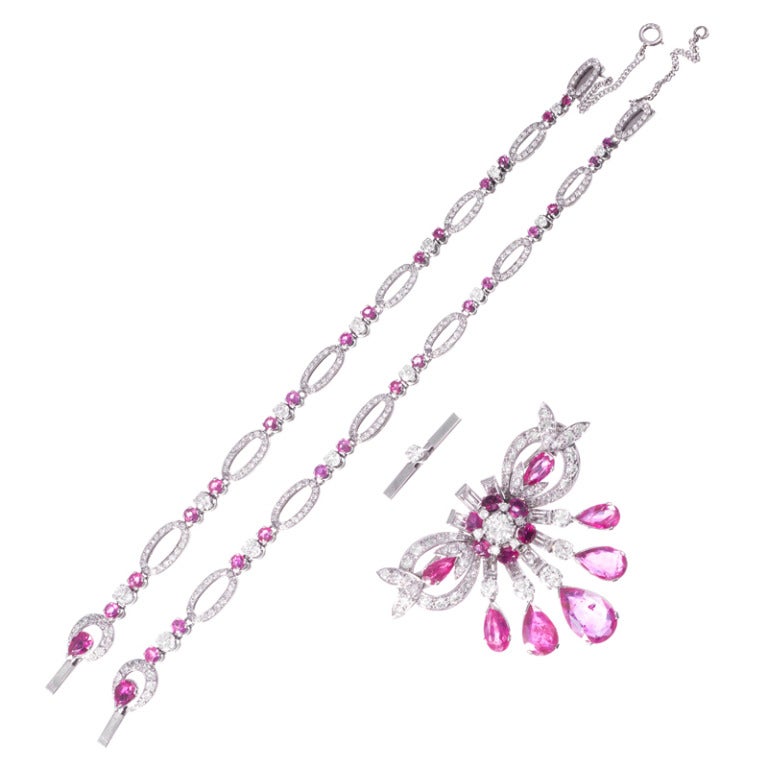 Platinum 1950s ruby and diamond necklace, converts to bracelets
diamonds weighing 10cttw  
rubies weighing 14.70cttw
Convertible from necklace into bracelets