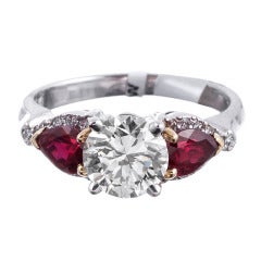 1.38 Carat Round Diamond Ring with Intense Red Pear-Shaped Ruby Accents