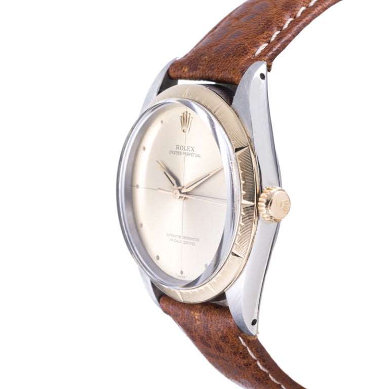 Montre-bracelet Rolex Zephyr en acier inoxydable et or avec cadran en forme de gobelet, années 1960