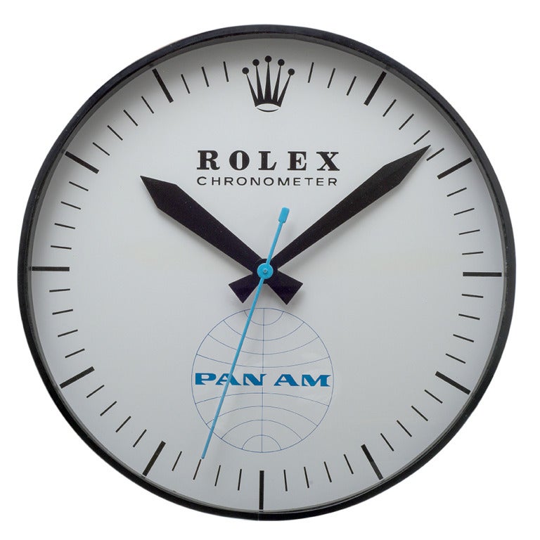 Rolex Pan Am plug–in wall clock from circa 1960 which previously hung in Pan Am's headquarters in NYC. Rolex and Pan Am had a special relationship, as Rolex developed the GMT for Pan Am pilots to be able to tell time simultaneously in two time zones