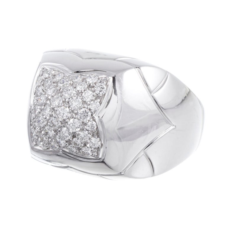 18k white gold ring, classic Bulgari design, decorated with .60 carats of diamonds in a four-sided design at the top. This is a great fashion piece, with recognizable Bulgari style. The ring is presented in its original Bulgari box and is sizable on