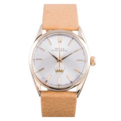 Vintage Rolex Stainless Steel Back and Gold Top Hallmark Logo Presentation Wristwatch circa 1960s