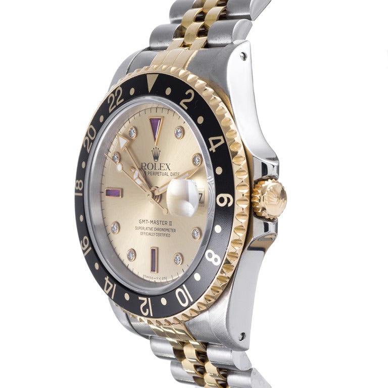 Rolex rare stainless steel and 18k yellow gold GMT-Master with ruby 