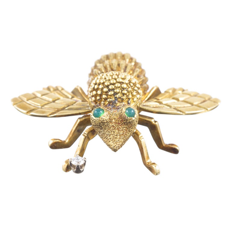 This life-like golden bee will buzz his way into your jewel box and bring much joy! Whether you pin him to your sleeve, lapel, hat or scarf, this finely detailed critter will add a hint of whimsy  to your wardrobe. Measuring 1.5 by 1.25 inches and