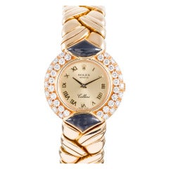 Retro Rolex Lady's Yellow Gold, Diamond and Onyx Cellini Bracelet Watch circa 1980s