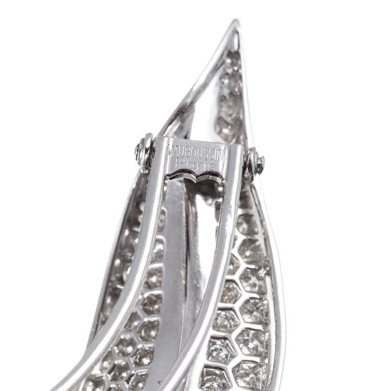 18k white gold leaf design brooch, set with 1.90 carats of white brilliant diamonds. Signed 