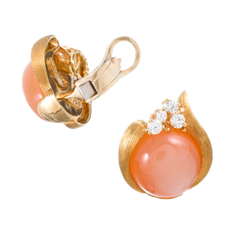 Henry Dunay is a master American goldsmith whose designs have inspired many jewelry enthusiasts to become devoted to his unique creations. These earrings of his have his signature florentine-style 