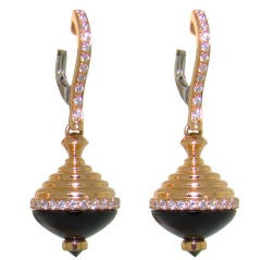 18K Rose Gold, White Gold, Onyx, Black Diamond 
White Diamond