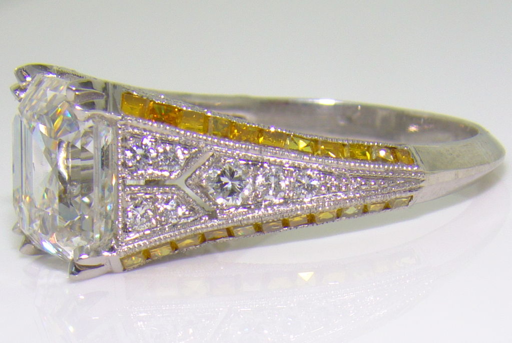 Platinum, White Diamond & Yellow Diamond Ring - Asscher Cut Diamond weighing over 5.00 carats, Forty-Four Square-Cut Yellow Diamonds, Thirty-Eight Round-Brilliant-Cut Diamonds weighing 0.73 carats, Estate