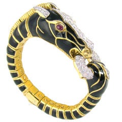 Bracelet DAVID WEBB cheval et mors en or jaune 18 carats, diamants et rubis