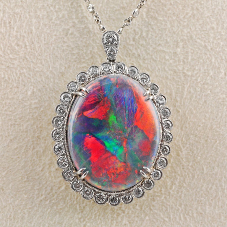 Highly sought after, the amazing Black Opal is a cherished treasure! It was sourced from the finest black opal mines in Lightning Ridge, Australia. The setting is perfectly made to add sparkle without distracting from the opulence of the Opal.