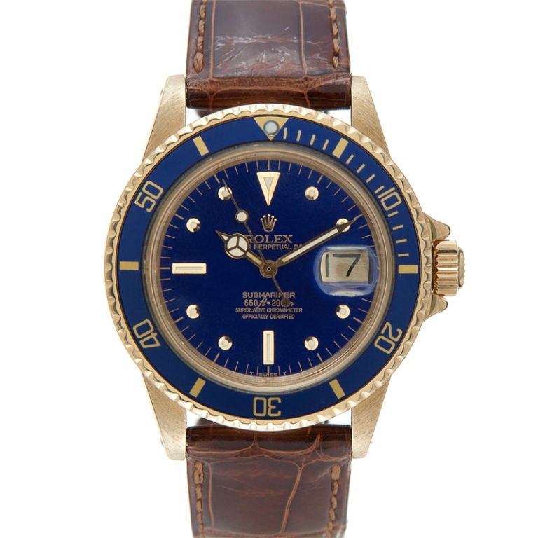 1970's 18K Yellow Gold Blue Submariner Ref. #1680 by Rolex: <br />
-Excellent Condition<br />
-Rare 