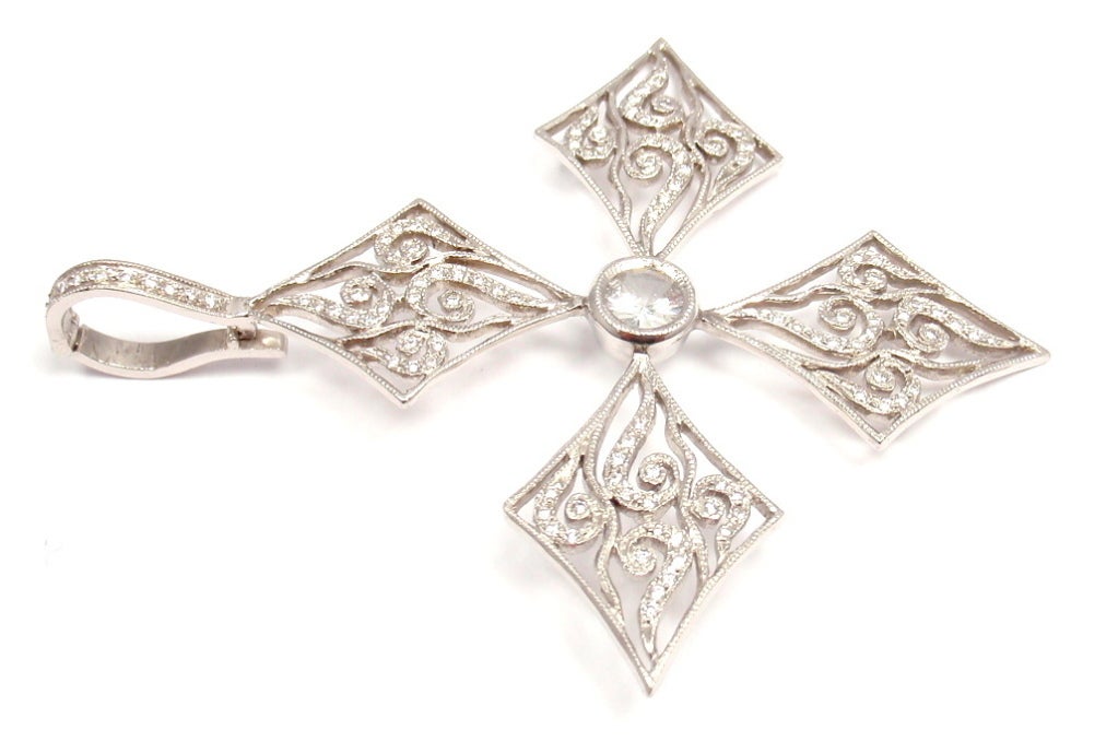 Beautiful Platinum Diamond Cross Charm Pendant by Cathy Waterman. With 106 Round Brilliant Cut Diamonds, VS-SI. Total Diamond Weight: 1.0ct. 

Details: 
Weight: 9.0 grams
Length: 2 1/4