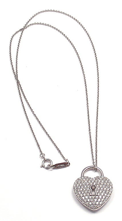 Stunning Platinum Diamond Heart Lock Pendant Necklace by Tiffany & Co. With 120 round brilliant cut diamonds, VS1 clarity, G color. Total diamond weight: .67ct. 

Details: 
Necklace Length: 18