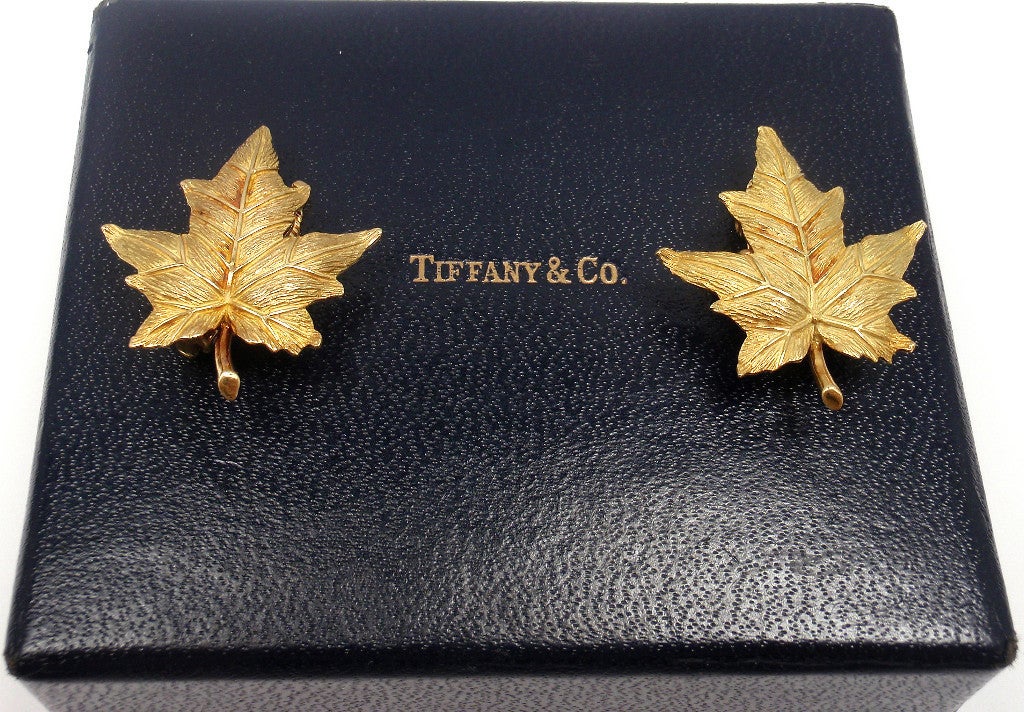 18k Yellow Gold Textured Leaf Earrings by Tiffany & Co. These earrings come with an original Tiffany & Co box. 

Details: 
Length: 1 1/4