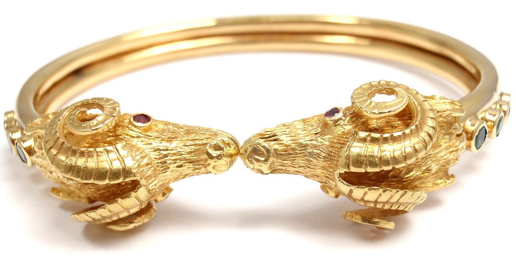 18k Yellow Gold Emerald Ruby Ram Head Bangle Bracelet from Illias Lalaounis. This piece is from the 
