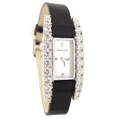 Vintage AUDEMARS PIGUET Lady's White Gold, Diamond, Mother-of-Pearl and Ruby Wristwatch
