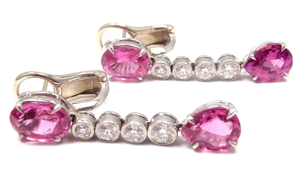 These Platinum Pink Sapphire Diamond Earrings come from the Magnificent BVLGARI. These earrings come with a Bvlgari Insurance Appraisal and its original Bvlgari box. 

Stone Details: 
4 Total Pink Sapphire Stones
2 Oval-Cut & 2 Pear-Shaped Pink
