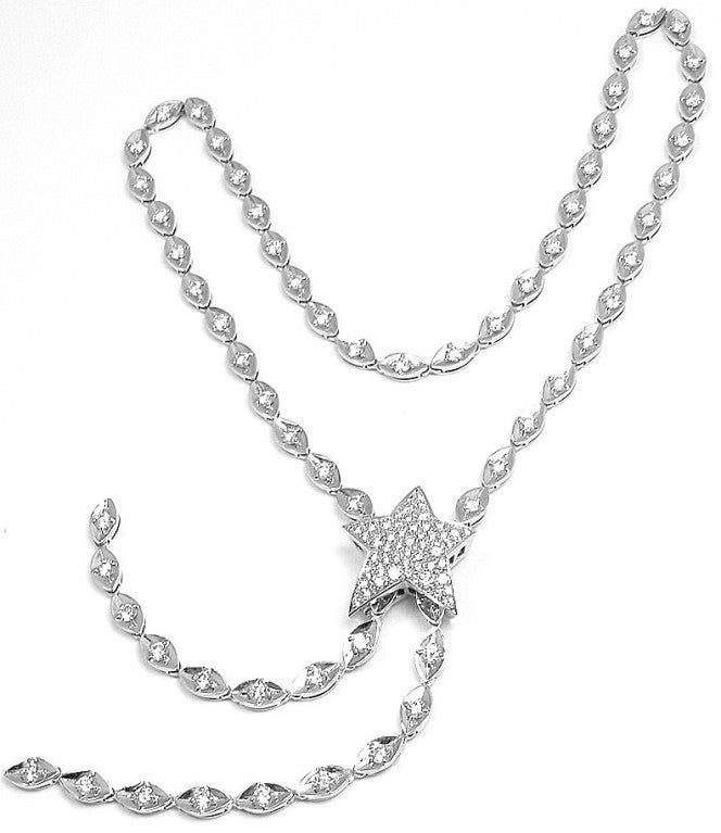 Rare 18k White Gold Diamond Lariat Necklace by Chanel. With 130 Diamonds, VVS1 Clarity, F Color. Total Diamond Weight: 5CT. This magnificent necklace comes with an original Chanel box.

Details: 
Weight: 33.3 grams
Length: Lariat could be worn