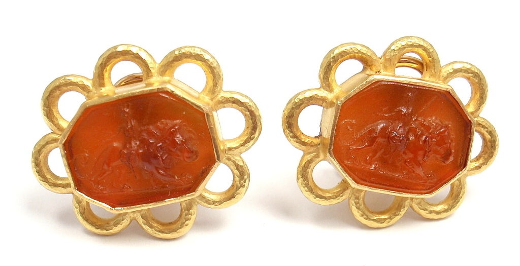 18k Yellow Gold Venetian Glass Intaglio Carved Earrings by Elizabeth Locke. With large oblong shaped venetian orange glass intaglio of a man on an animal. Collapsible posts with omega backs. 

Details:
Weight: 20.9 grams
Measurements: 24mm x
