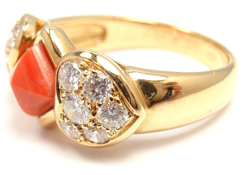 18k Yellow Gold Diamond Heart Coral Ring by Christian Dior. With 12 diamonds, VVS1 clarity, E color. Total Diamond Weight: 1.8CT. One Coral stone: 6mm x 6mm.

Details:
Ring Size: 8.75 (resize available) 
Weight: 8.2 grams
Width: Band is 3mm at