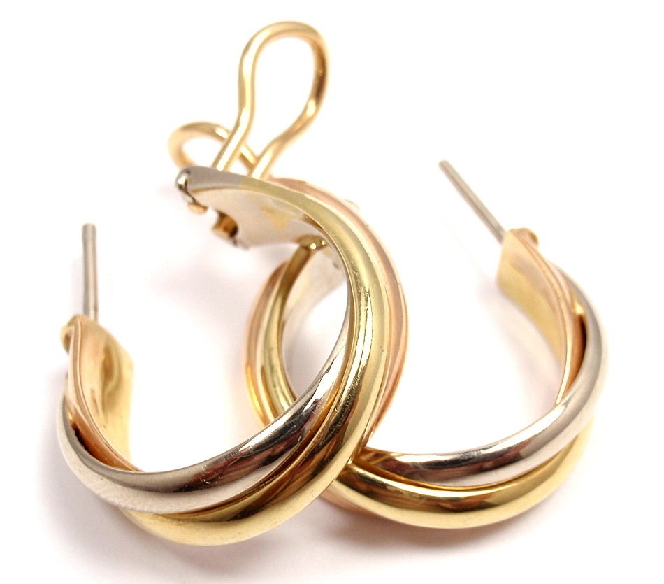 18k Tri-Color (Yellow, White, Rose) Gold Diamond Trinity Earrings by Cartier. 

Details: 
Weight: 19.2 grams 
Length: 23mm
Width: 6mm, diameter: 3/4 inch