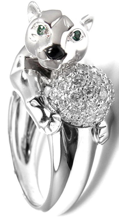 18k White Gold Diamond, Emerald, and Black Onyx Panther Ring by Cartier. Part of Cartier's 