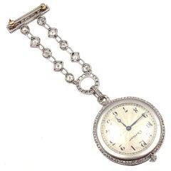 Antique Cartier Lady's Platinum and Diamond Lapel Watch