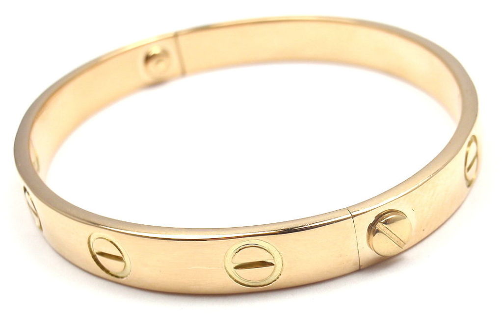 18k Yellow Gold Love Bangle, Size 16, by Cartier. This beautiful Cartier Love Bangle comes with a Cartier box and Screwdriver. 

Details: 
Size 16
Weight: 25.8 grams 
Width: 6.5mm
Stamped Hallmarks: Cartier 750 427061
*Free Shipping within