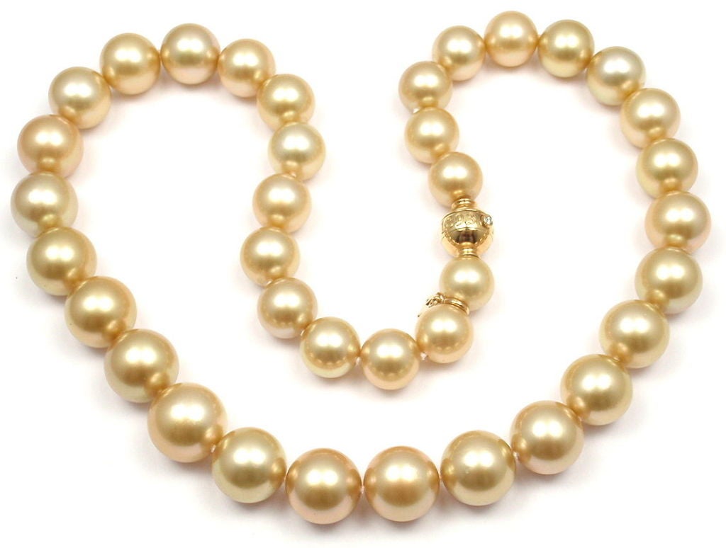 18k Yellow Gold Diamond Large Golden South Sea Peal Necklace by Mikimoto. With 37 Total Golden South Sea Large Pearls, from 13.5mm - 10.5mm in diameter, on a 18