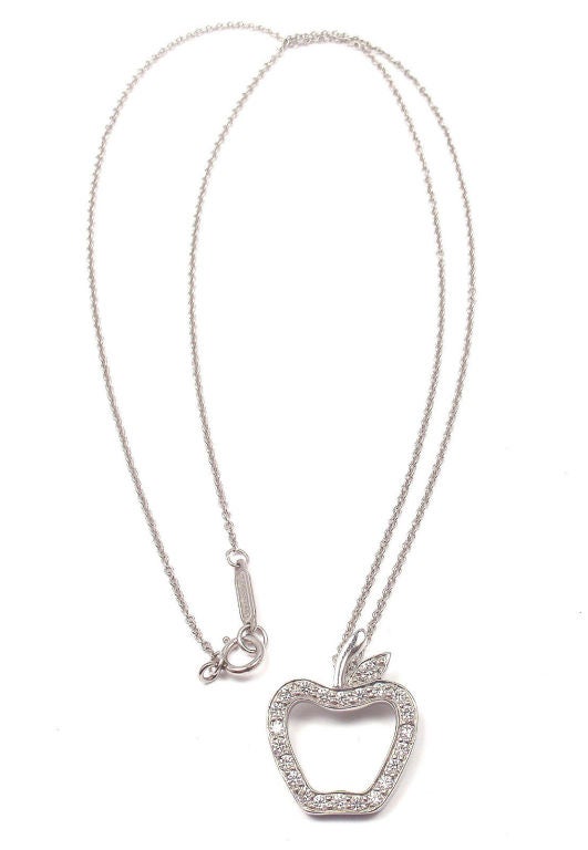 Platinum Diamond Apple Pendant Necklace by Tiffany & Co. With 22 round brilliant cut diamonds, VS clarity, G color. Total Diamond Weight: .25CT.

Details: 
Chain Length: 16