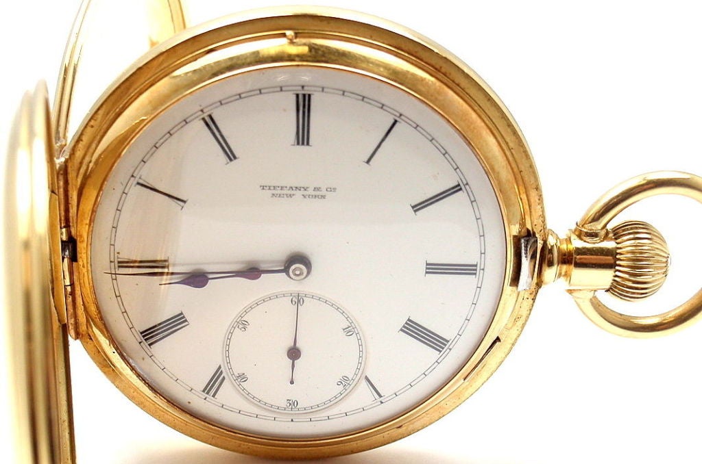 Jules Jurgensen Demi-Hunter Case Pocket Watch retailed by Tiffany & Co. This watch has a solid 18k yellow gold case, it is in working condition. Manual movement. This pocket watch comes with a Tiffany & Co letter that confirms that this watch was