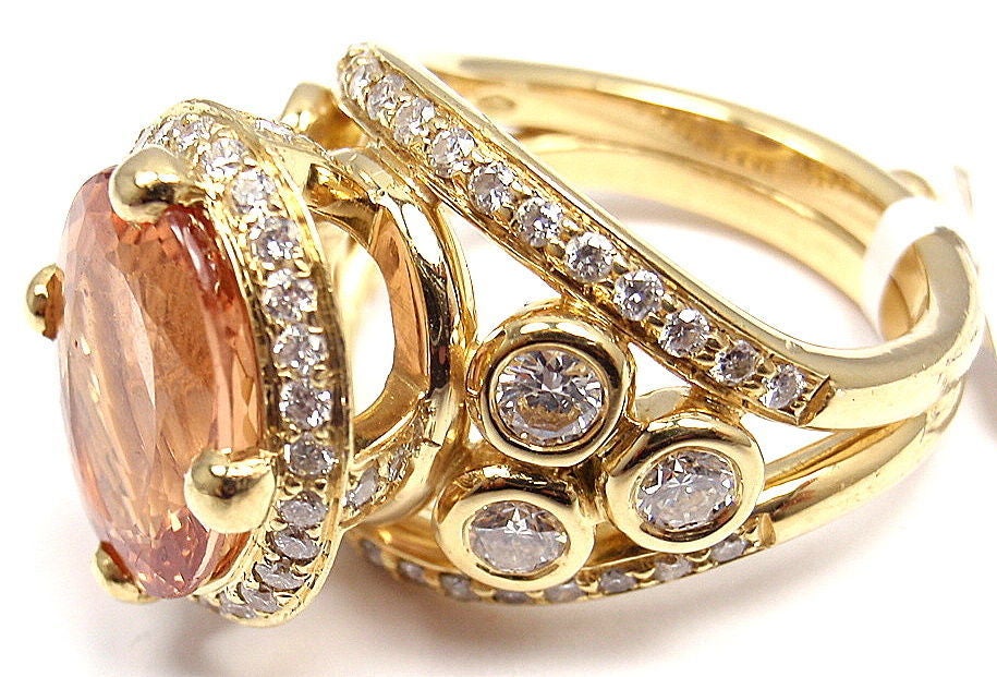 18k Yellow Gold Diamond & Imperial Topaz Ring by Temple St Clair. Total Diamond Weight: 1.355CT. Total Weight Imperial Topaz: 5.780CT. 

Details: 
Ring Size: 6.5
Width: 16mm
Weight: 14.1 grams
Stamped Hallmarks: Temple St Clair hallmark