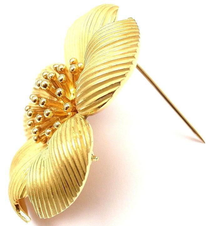 18k Yellow Gold Dogwood Flower Brooch by Tiffany & Co.

Details: 
Measurements: 1 1/2